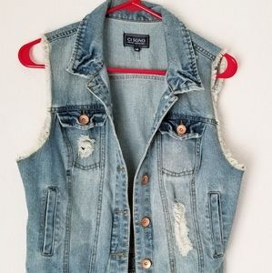 Lightly distressed denim vest.